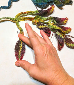 Close-up mage of crochet motif applique before blocking