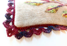 Load image into Gallery viewer, Close up image of completed optional crochet trim around pillow cover
